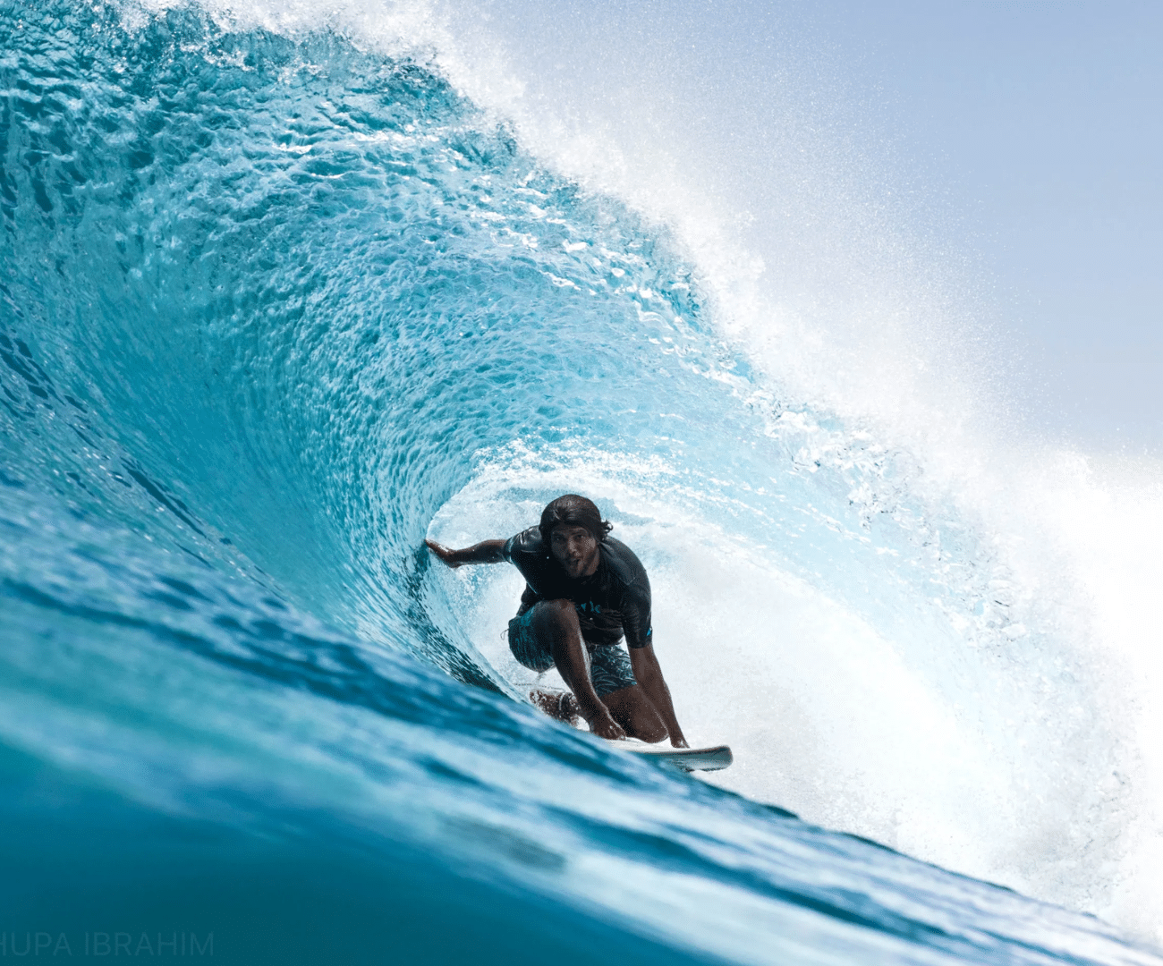 Surfing during a trip to the Maldives